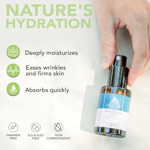 Hand holding a hydrating serum bottle with benefits listed