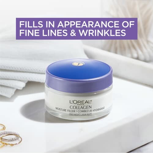 L'Oreal Paris Collagen Moisture Filler cream jar on a bathroom counter.