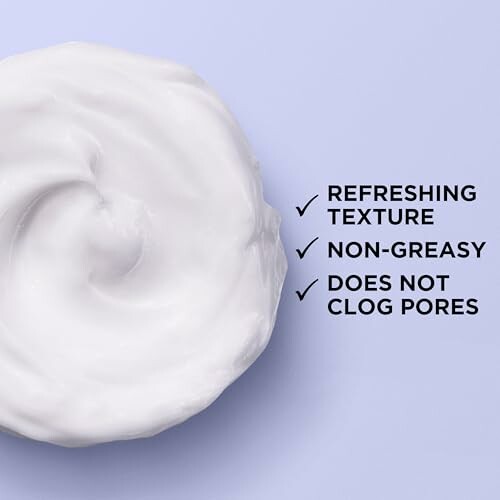 Swirl of white cream with text: Refreshing texture, non-greasy, does not clog pores.