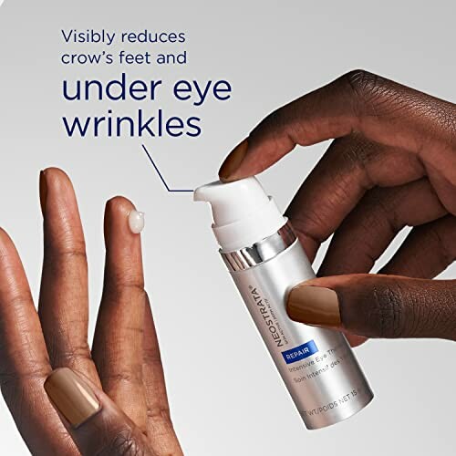 Applying Neostrata under eye cream to reduce wrinkles.