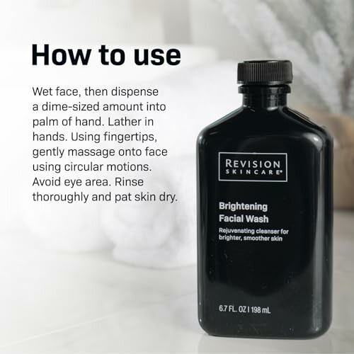 Bottle of Revision Skincare Brightening Facial Wash with usage instructions.