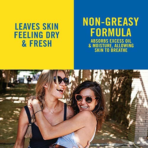 Two women smiling outdoors, promoting non-greasy formula skincare.