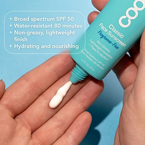 Person applying classic face sunscreen with SPF 50 on hand.