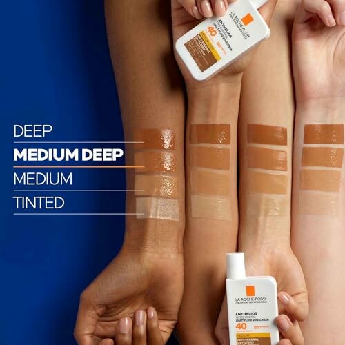 Arm swatches showcasing different sunscreen shades.