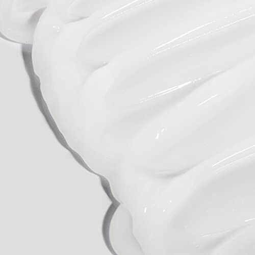 Close-up of smooth white cream texture.